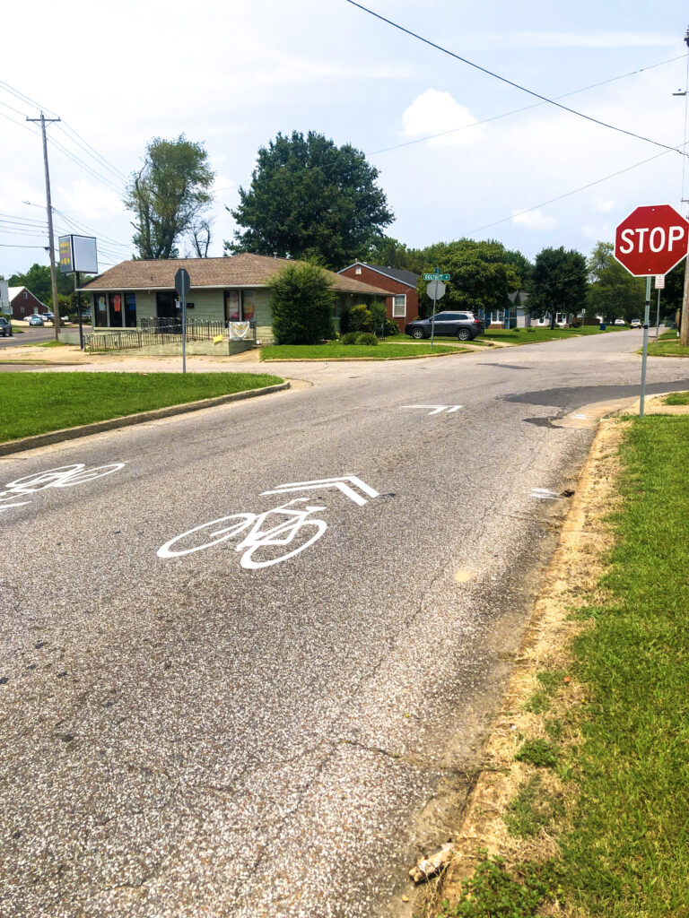 Neighborhood street indicating that street is shared with cyclist